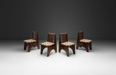 Charles Dudouyt Four Oak Chairs in the manner of Charles Dudouyt France 20th Century