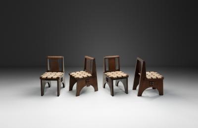 Charles Dudouyt Four Oak Chairs in the manner of Charles Dudouyt France 20th Century