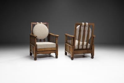Charles Dudouyt Mid Century Turned Oak Armchairs in the style of Charles Dudouyt France 1950s