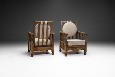 Charles Dudouyt Mid Century Turned Oak Armchairs in the style of Charles Dudouyt France 1950s