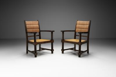 Charles Dudouyt Pair of Straw Armchairs in the manner of Charles Dudouyt Europe ca 1940s