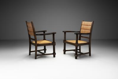 Charles Dudouyt Pair of Straw Armchairs in the manner of Charles Dudouyt Europe ca 1940s