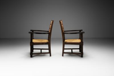 Charles Dudouyt Pair of Straw Armchairs in the manner of Charles Dudouyt Europe ca 1940s