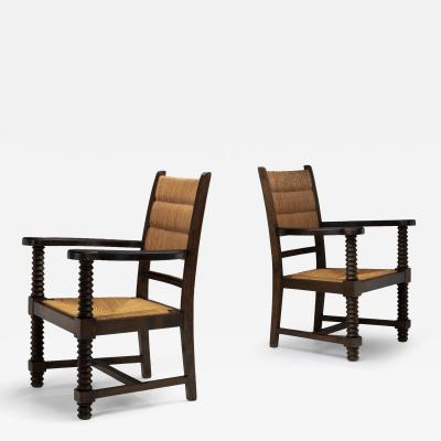 Charles Dudouyt Pair of Straw Armchairs in the manner of Charles Dudouyt Europe ca 1940s
