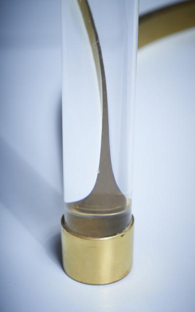 Charles Hollis Jones Pair of Nesting Tables in Brass glass in the manner of Charles Hollis Jones