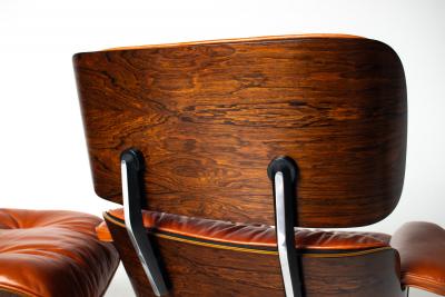Charles Ray Eames Eames Lounge Chair Ottoman by Herman Miller 3rd Generation in Orange Leather