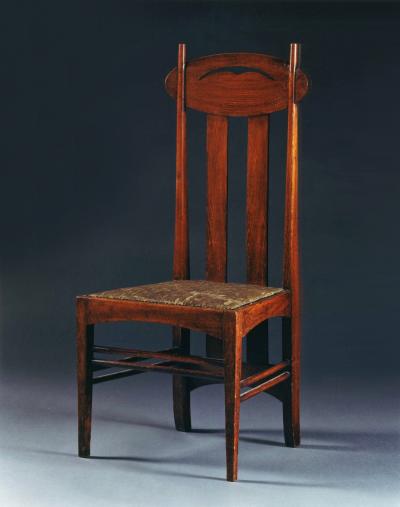 Charles Rennie Mackintosh A PAIR OF STAINED OAK DINING CHAIRS AFTER A DESIGN BY CHARLES RENNIE MACKINTOSH