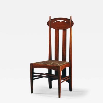 Charles Rennie Mackintosh A PAIR OF STAINED OAK DINING CHAIRS AFTER A DESIGN BY CHARLES RENNIE MACKINTOSH