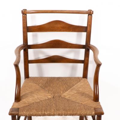Charles Robert Ashbee C R Ashbee An Arts Crafts Rush Seat Ladder Back Armchair