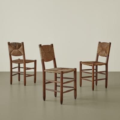 Charlotte Perriand Charlotte Perriand set of twelve Bauche chairs model no 19 1950s