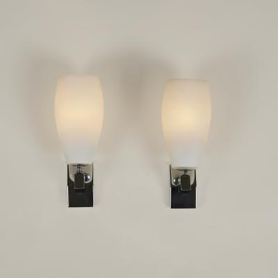 Chic Pair of Italian 1960s chrome and white glass wall lights