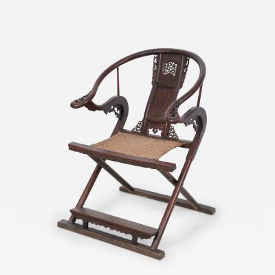 Chinese Carved Horseshoe Back Folding Chair