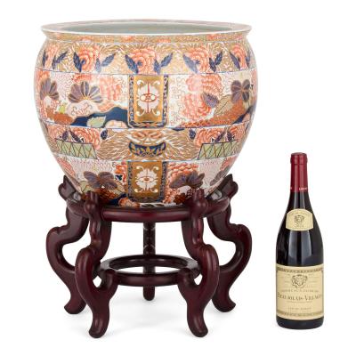 Chinese Imari porcelain planter on a wooden stand