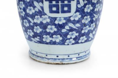 Chinese White and Blue Feather and Floral Motif Porcelain Urn
