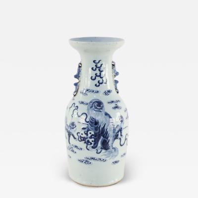 Chinese White and Blue Foo Dog and Serpent Design Porcelain Urn