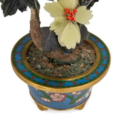 Chinese jade carnelian and quartz flower model in a cloisonn enamel planter