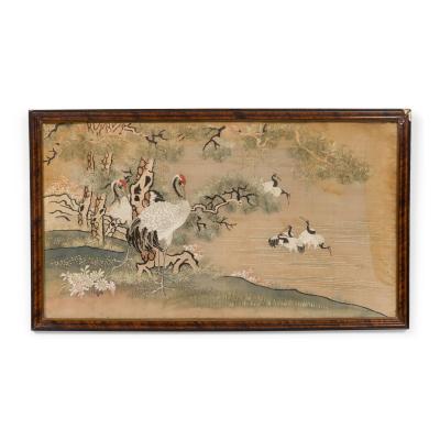 Chinese silk embroidery of herons on land and lake in a mahogany frame