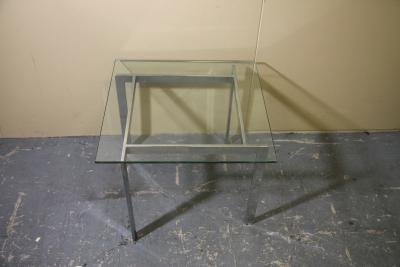 Chrome and glass side table in the manner of Milo Baughman