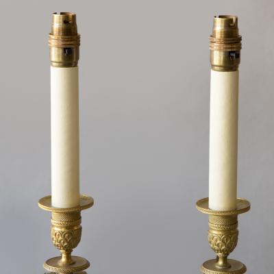 Claude Galle PAIR OF FRENCH EMPIRE GILT BRONZE AND MARBLE CANDLESTICKS CONVERTED TO LAMPS