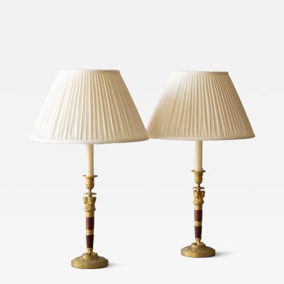 Claude Galle PAIR OF FRENCH EMPIRE GILT BRONZE AND MARBLE CANDLESTICKS CONVERTED TO LAMPS