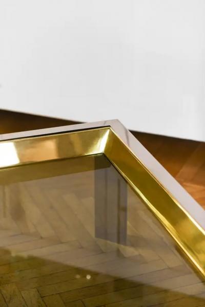 Coffee table in brass and chromed metal with glass top Italy 1970