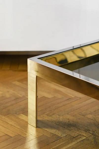 Coffee table in brass and chromed metal with glass top Italy 1970