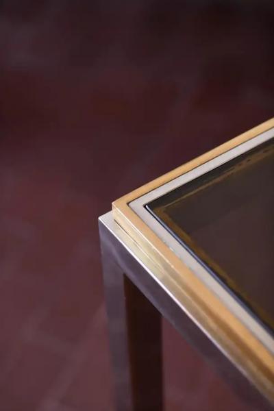 Coffee table in brass and chromed metal with smoked glass shelves Italy 1980