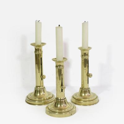 Collection of 3 French 19th Century Brass Bistro Push Up Candleholders