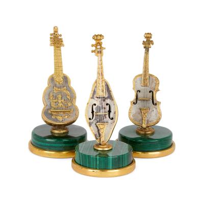 Collection of 7 Italian silver and malachite musical instruments models