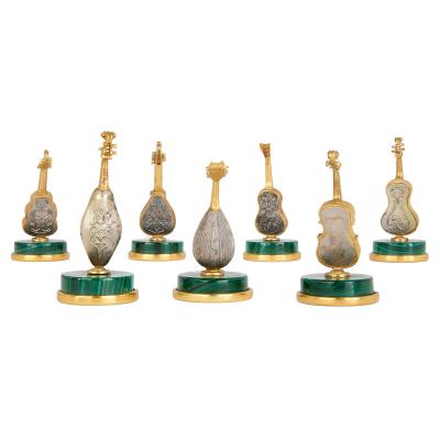 Collection of 7 Italian silver and malachite musical instruments models