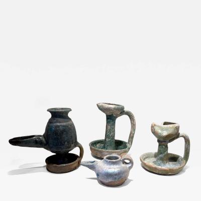 Collection of Four Middle Eastern Glazed Ceramic Oil Lamps