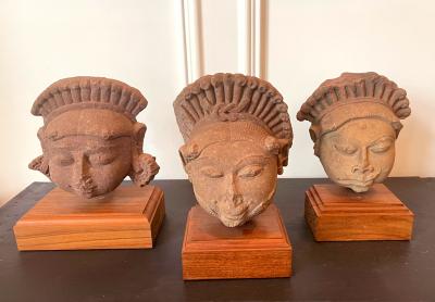 Collection of Three Indian Sandstone Carved Heads of Deities