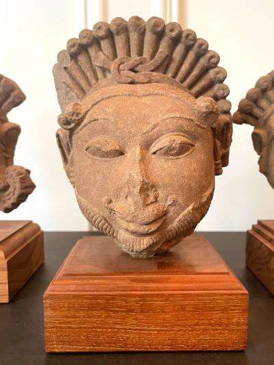 Collection of Three Indian Sandstone Carved Heads of Deities