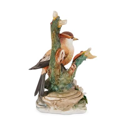 Collection of five bisque porcelain bird models