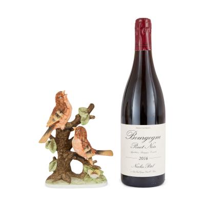 Collection of four 20th century bisque porcelain bird models