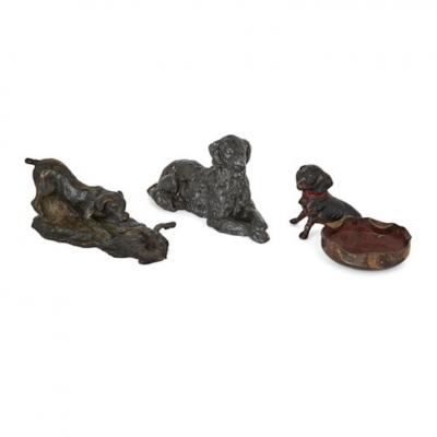Collection of twenty metal dogs of various types