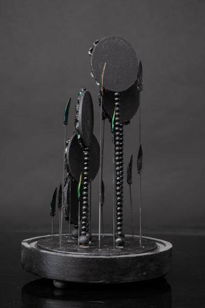 Composition of Feathers and Butterflies under an Oval dome 