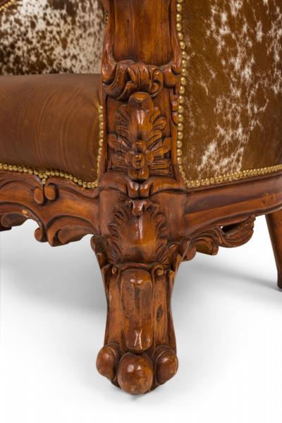Contemporary American Carved Walnut and Cowhide Wide Lounge Armchairs