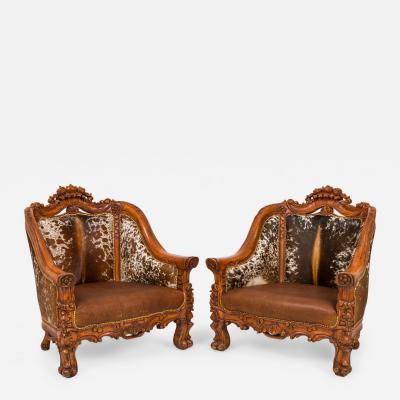 Contemporary American Carved Walnut and Cowhide Wide Lounge Armchairs