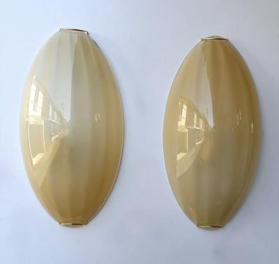 Contemporary Pair of Yellow Gold Leaf Murano Glass and Brass Sconces Italy