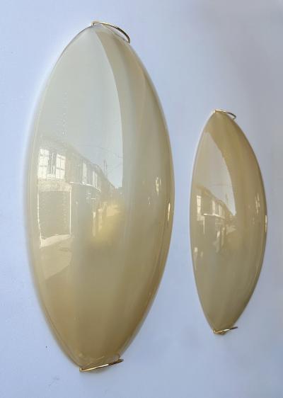 Contemporary Pair of Yellow Gold Leaf Murano Glass and Brass Sconces Italy