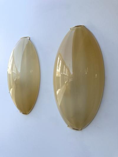 Contemporary Pair of Yellow Gold Leaf Murano Glass and Brass Sconces Italy