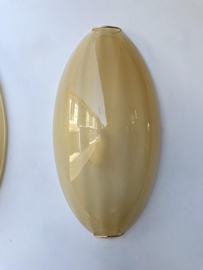 Contemporary Pair of Yellow Gold Leaf Murano Glass and Brass Sconces Italy