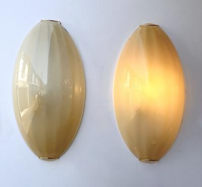 Contemporary Pair of Yellow Gold Leaf Murano Glass and Brass Sconces Italy