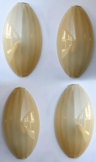 Contemporary Pair of Yellow Gold Leaf Murano Glass and Brass Sconces Italy