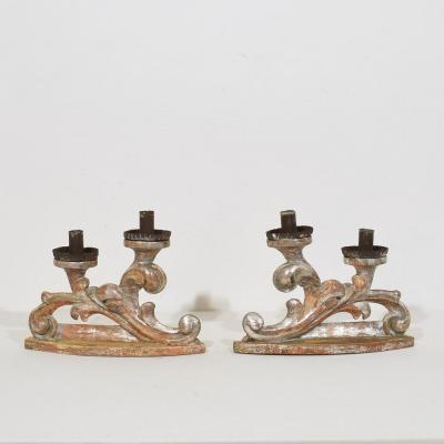 Couple of 18th Century Italian Baroque Carved Wooden And Silvered Candleholders