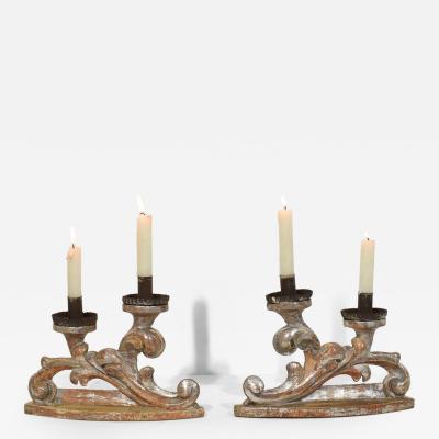 Couple of 18th Century Italian Baroque Carved Wooden And Silvered Candleholders