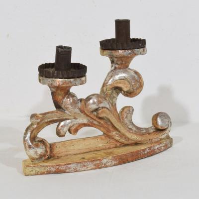Couple of 18th Century Italian Baroque Carved Wooden And Silvered Candleholders