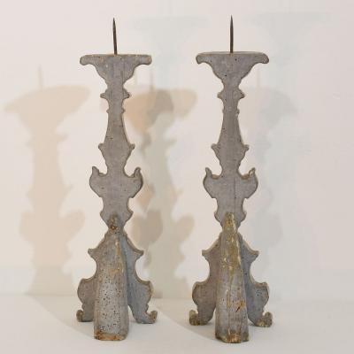 Couple of 18th Century Italian Baroque Carved Wooden And Silvered Candlesticks