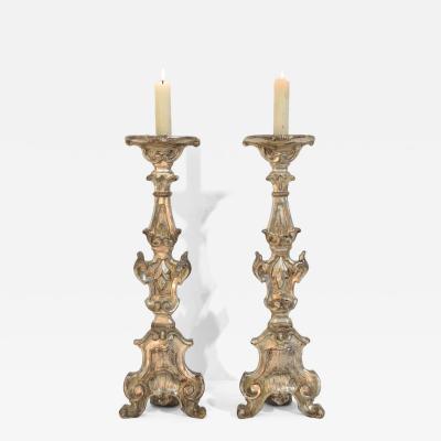 Couple of 18th Century Italian Baroque Carved Wooden And Silvered Candlesticks